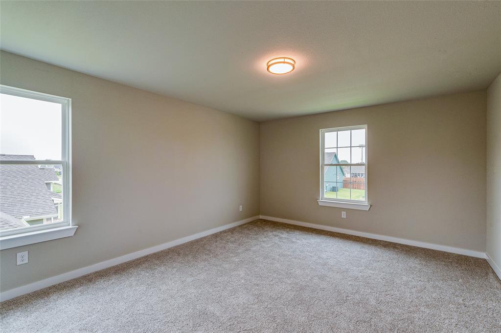 602 Kyle Drive Tioga, TX 76271 - Photo 26 of 29 an empty room with windows
