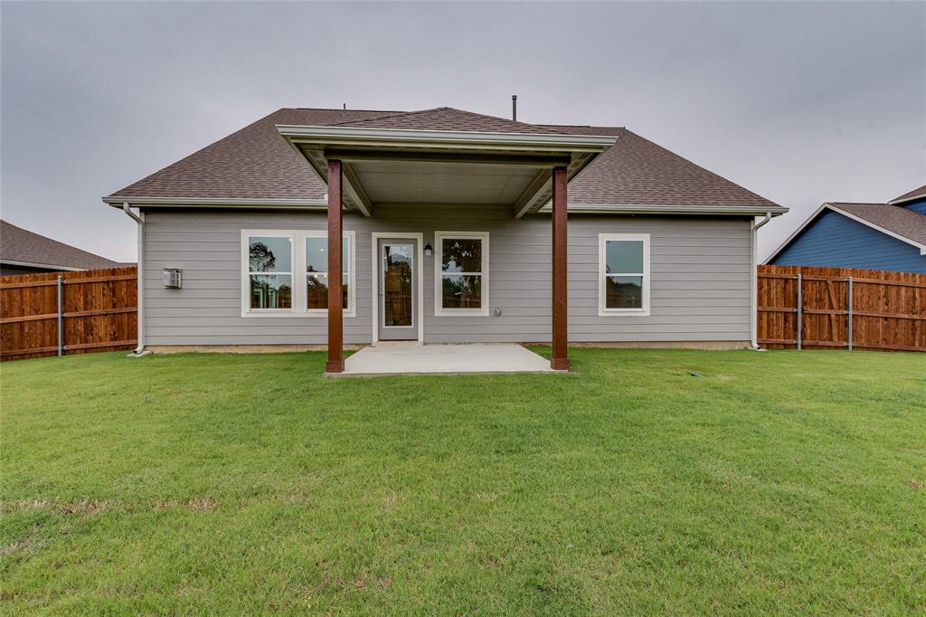 602 Kyle Drive Tioga, TX 76271 - Photo 29 of 29 a view of a house with garden
