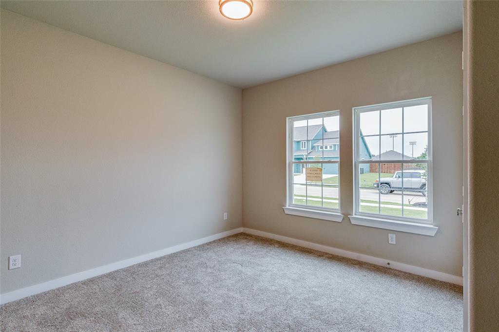 602 Kyle Drive Tioga, TX 76271 - Photo 6 of 29 an empty room with a window