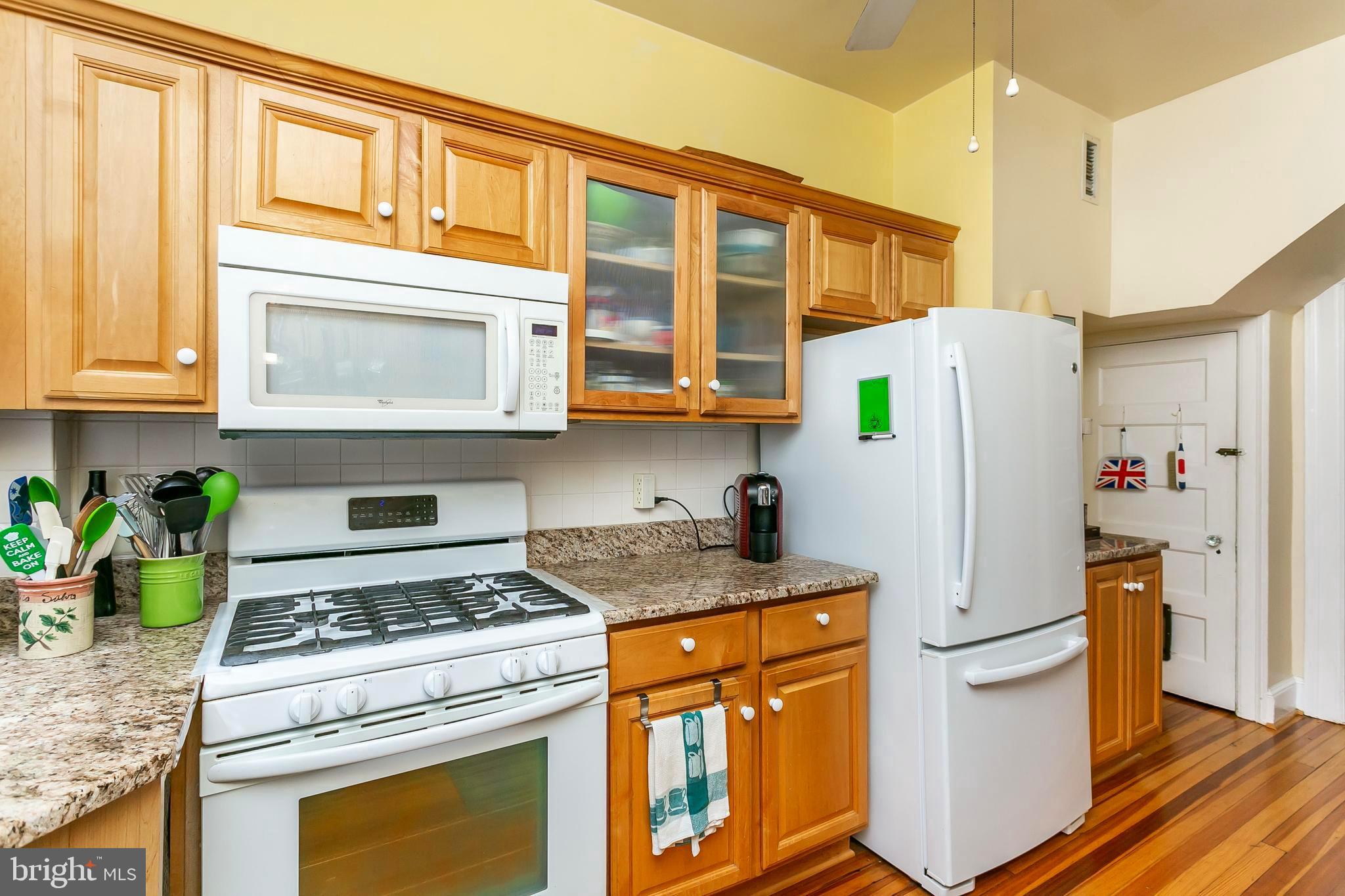 3952 Cloverhill Road Baltimore, MD 21218 - Photo 20 of 65 Kitchen with Gorgeous Wood Floors
