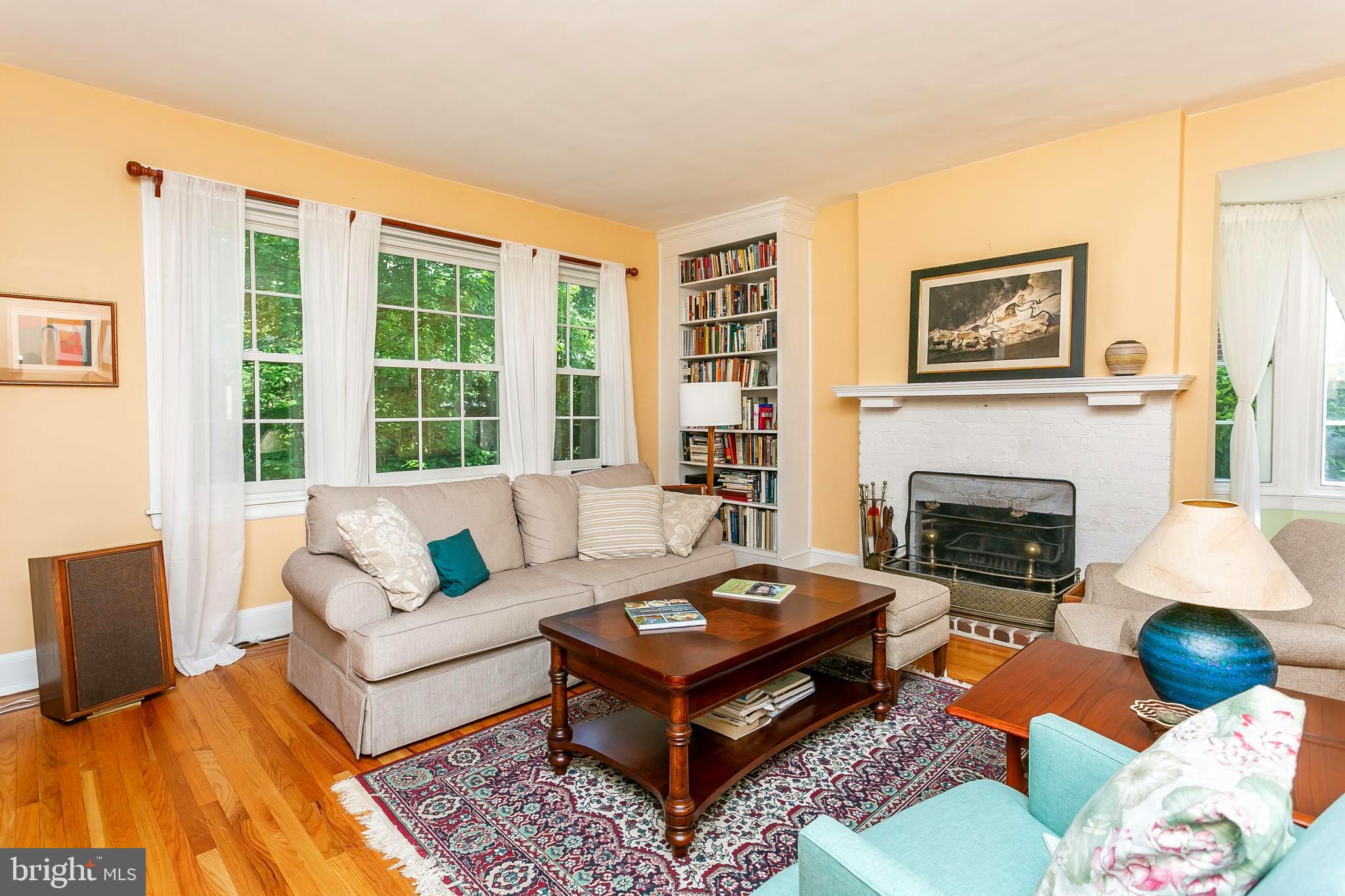 3952 Cloverhill Road Baltimore, MD 21218 - Photo 7 of 65 Living Room with Wood Burning Fireplace