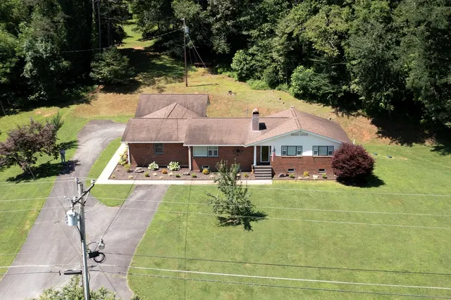 a view of swimming pool with outdoor seating