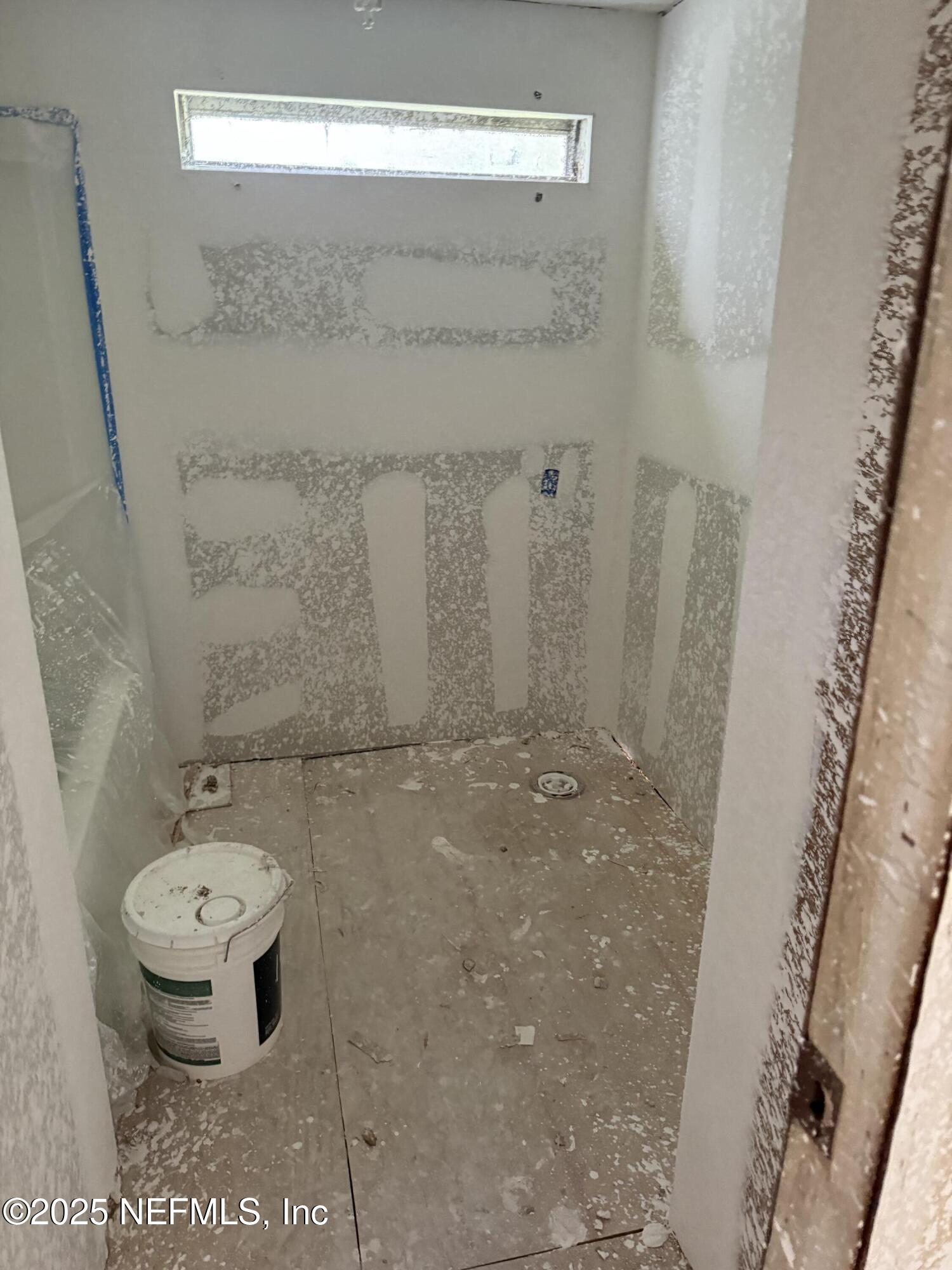 1193 Crum Street Starke, FL 32091 - Photo 5 of 10 a bathroom with a sink toilet and shower