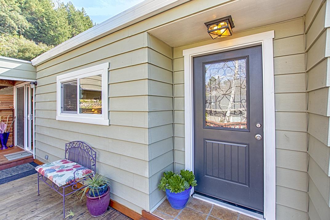 552 Bean Creek Road, Unit 57 Scotts Valley, CA 95066 - Photo 12 of 20 a front view of a house with outdoor seating