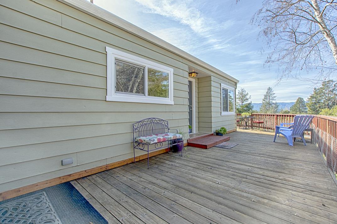 552 Bean Creek Road, Unit 57 Scotts Valley, CA 95066 - Photo 13 of 20 a view of a deck with wooden floor and seating space