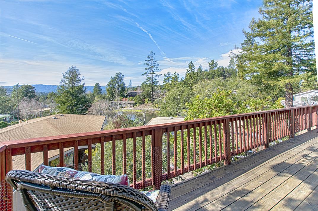 552 Bean Creek Road, Unit 57 Scotts Valley, CA 95066 - Photo 15 of 20 a balcony with wooden floor and outdoor space