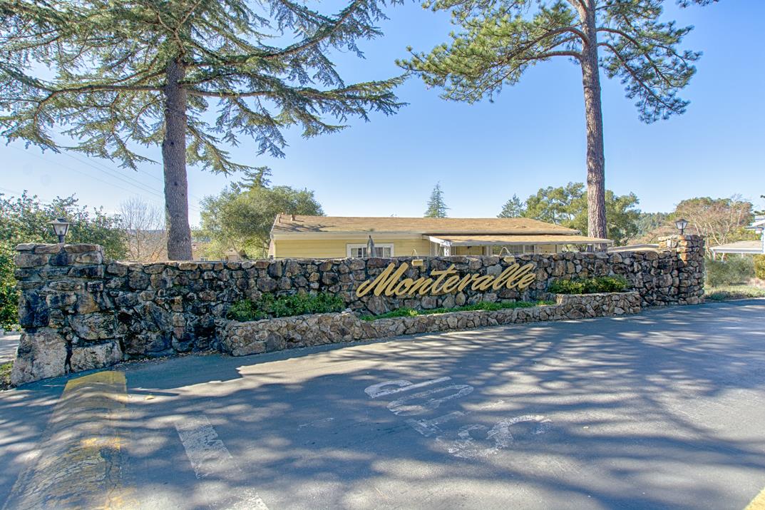 552 Bean Creek Road, Unit 57 Scotts Valley, CA 95066 - Photo 19 of 20 a view of a pathway with a wrought fence