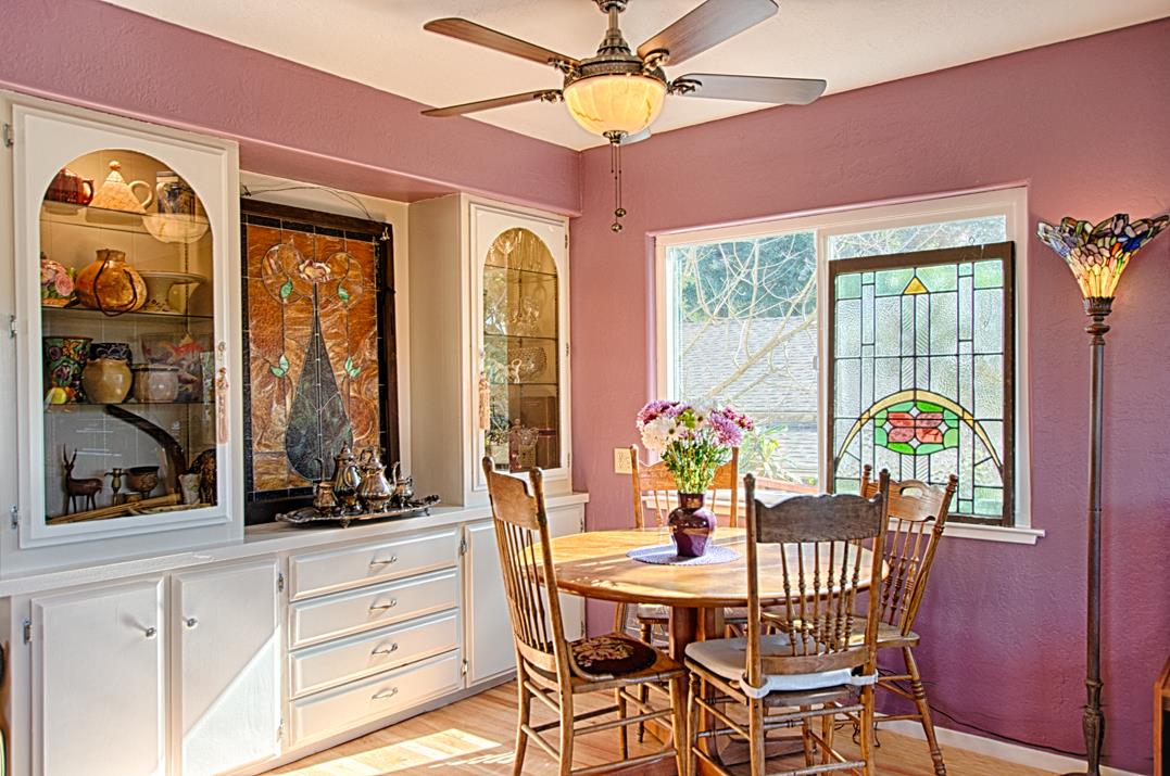 552 Bean Creek Road, Unit 57 Scotts Valley, CA 95066 - Photo 6 of 20 a dining room with furniture a chandelier and a rug