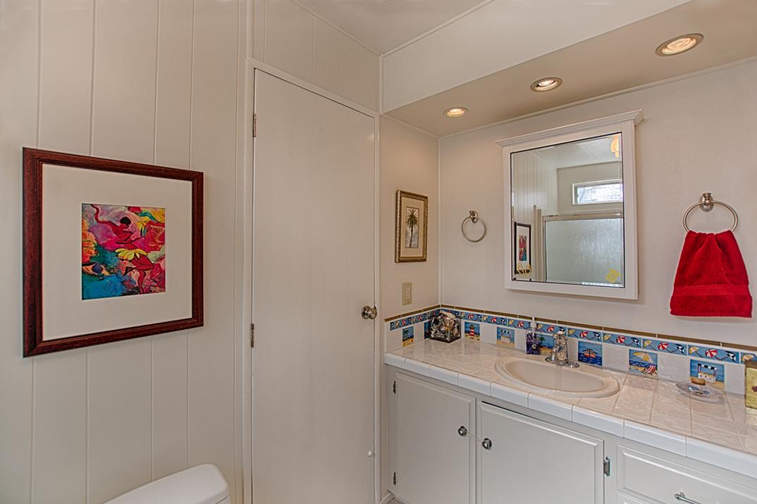 552 Bean Creek Road, Unit 57 Scotts Valley, CA 95066 - Photo 10 of 20 a bathroom with a sink and a mirror