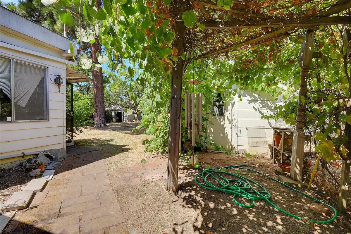 2060 Locust Street Sutter, CA 95982 - Photo 31 of 61 BACKYARD ENTRANCE FROM THE FRONT YARD , BETWEEN THE TWO DWELLINGS