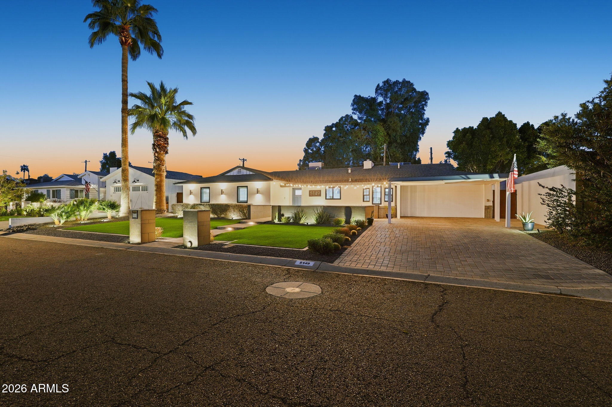 5149 North 34th Street Phoenix, AZ 85018 - Photo 6 of 70 a view of a street with palm trees