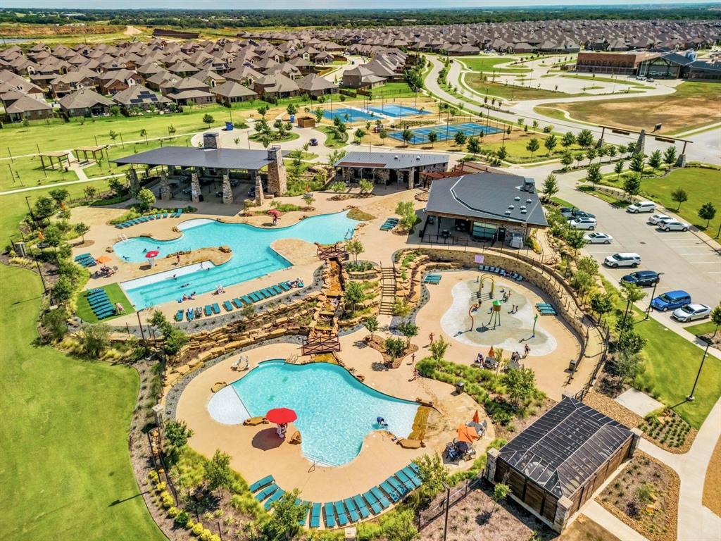 11105 Autry Ridge Lane Aubrey, TX 76227 - Photo 16 of 27 an aerial view of residential houses with outdoor space