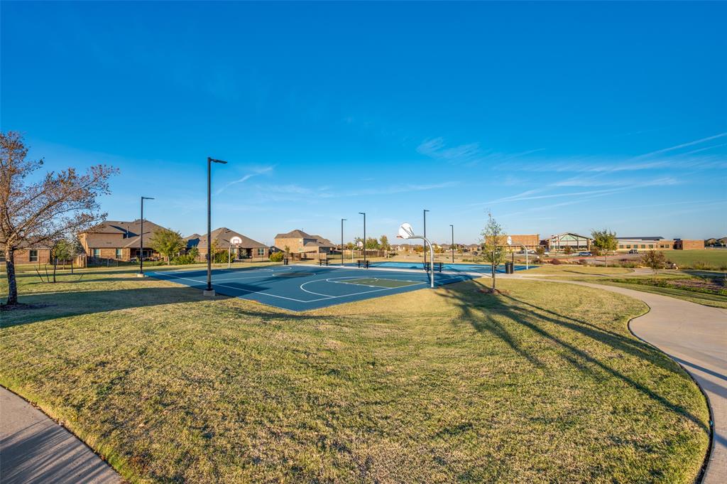 11105 Autry Ridge Lane Aubrey, TX 76227 - Photo 19 of 27 a view of swimming pool with outdoor seating