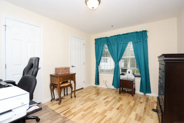 a room with furniture and a window