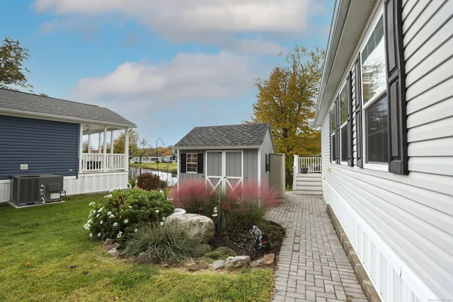 a view of a house with a garden