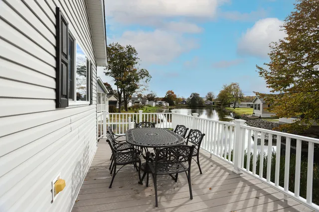 a view of a chairs on the roof deck