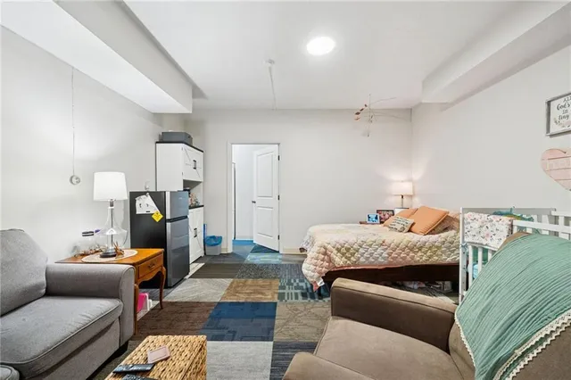 a bedroom with furniture and a couch