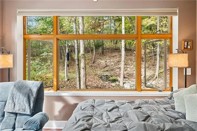 a living room with couch and a window