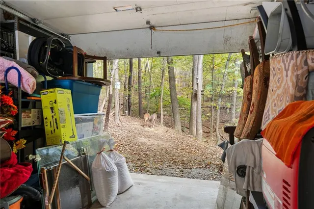 a view of a house with a sink and backyard