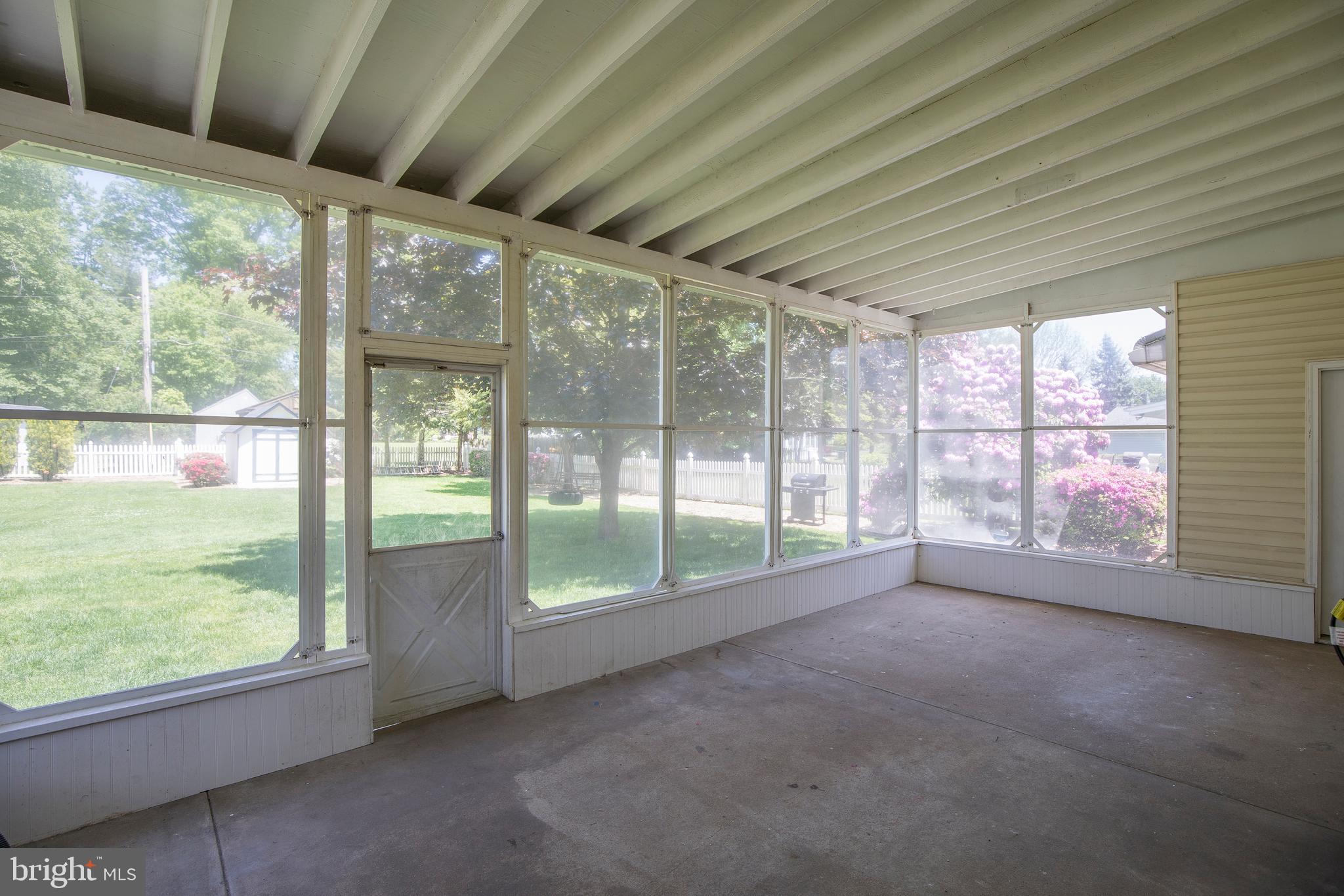 25 Belair Road Warminster, PA 18974 - Photo 12 of 23 3 Season Room with Screens and Plexi-Glass Panels