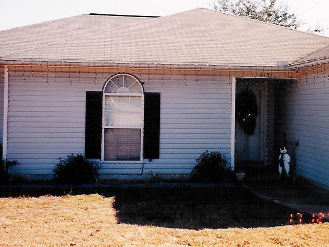6151 Old Hickory Road Crestview, FL 32539 - Photo 1 of 1 a front view of a house with a yard