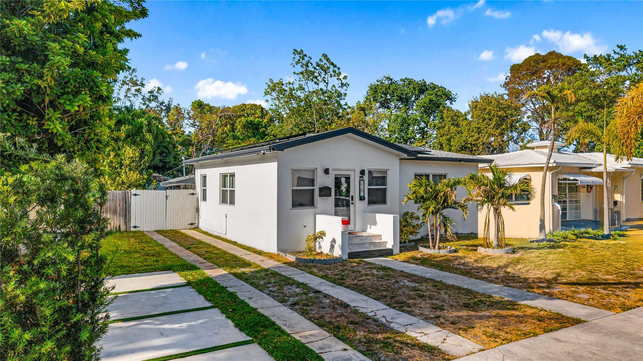 218 Southwest 7th Street Dania Beach, FL 33004 - Photo 15 of 57 a view of a house with backyard and sitting area