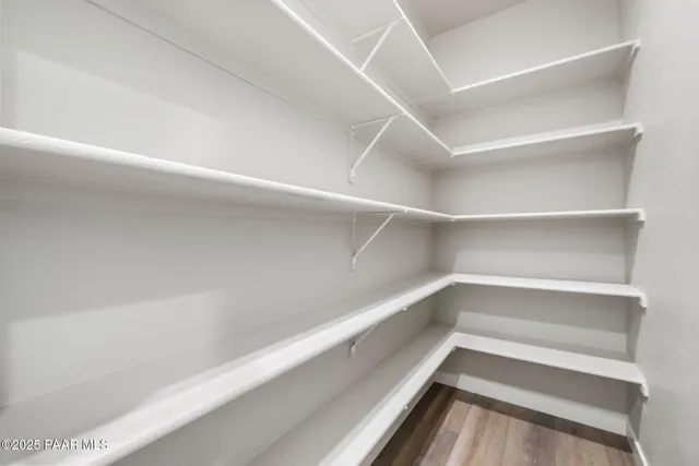 a view of an empty walk in closet