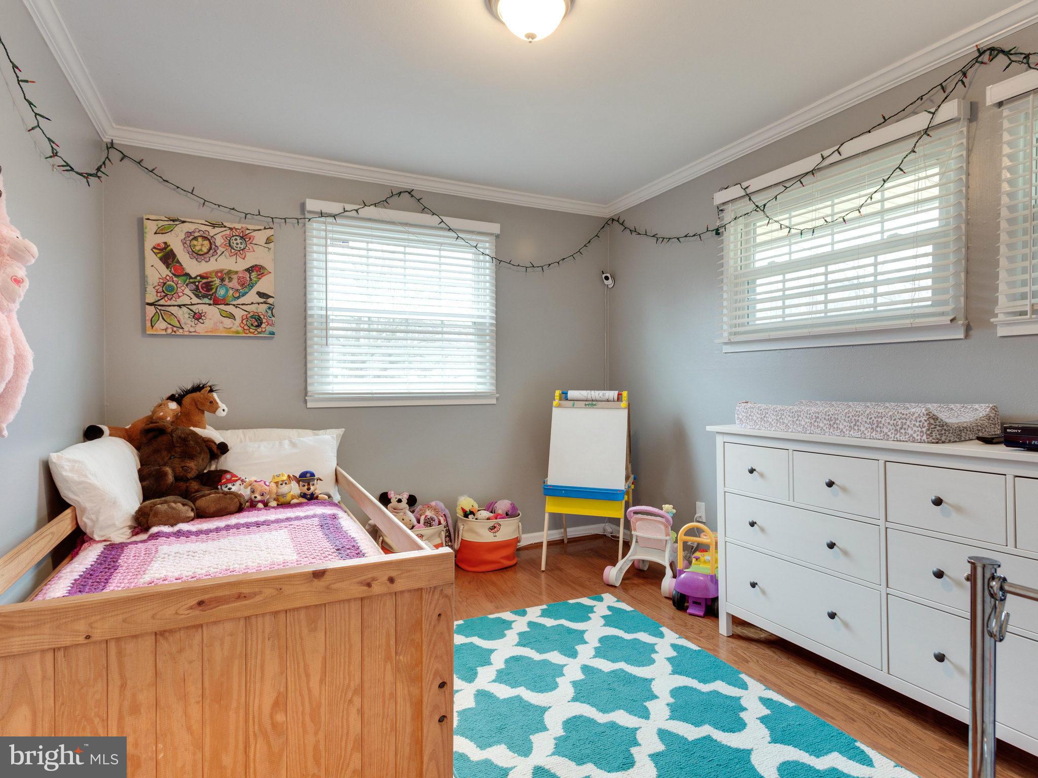 5303 Inverchapel Road Springfield, VA 22151 - Photo 11 of 18 a bed room with a bed and a window