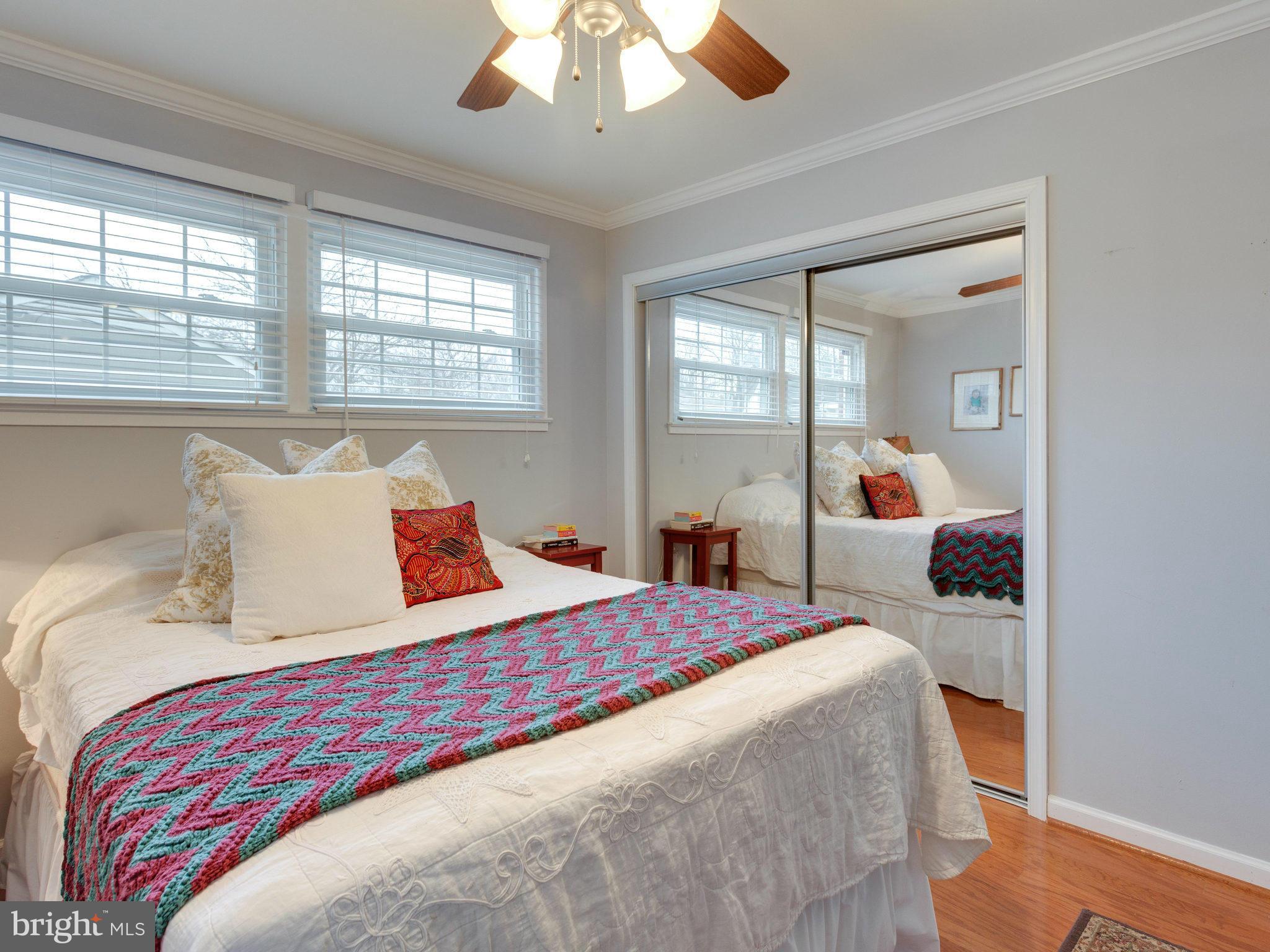 5303 Inverchapel Road Springfield, VA 22151 - Photo 15 of 18 a bedroom with a large bed and a large window