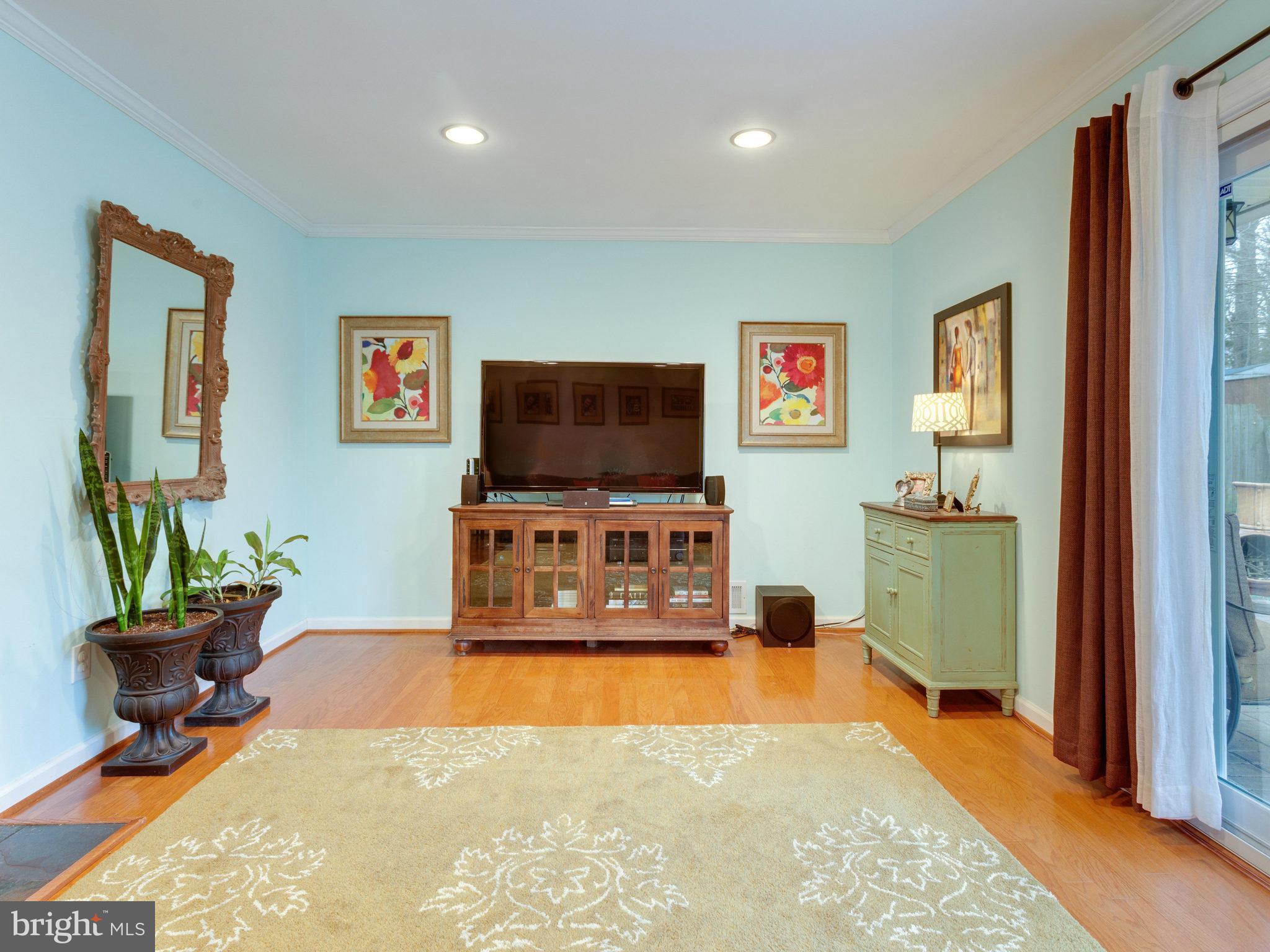 5303 Inverchapel Road Springfield, VA 22151 - Photo 5 of 18 a living room with furniture and a flat screen tv