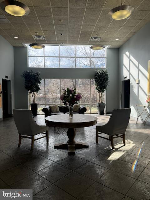 3750 Main Street, Unit 509 Philadelphia, PA 19127 - Photo 3 of 23 a living room with furniture and a large window