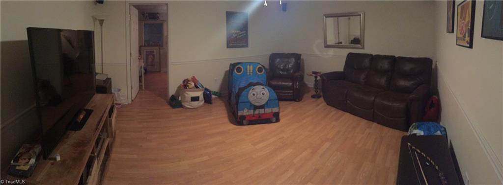 135 Aaron Road Elkin, NC 28621 - Photo 11 of 16 Playroom/Den is finished basement.