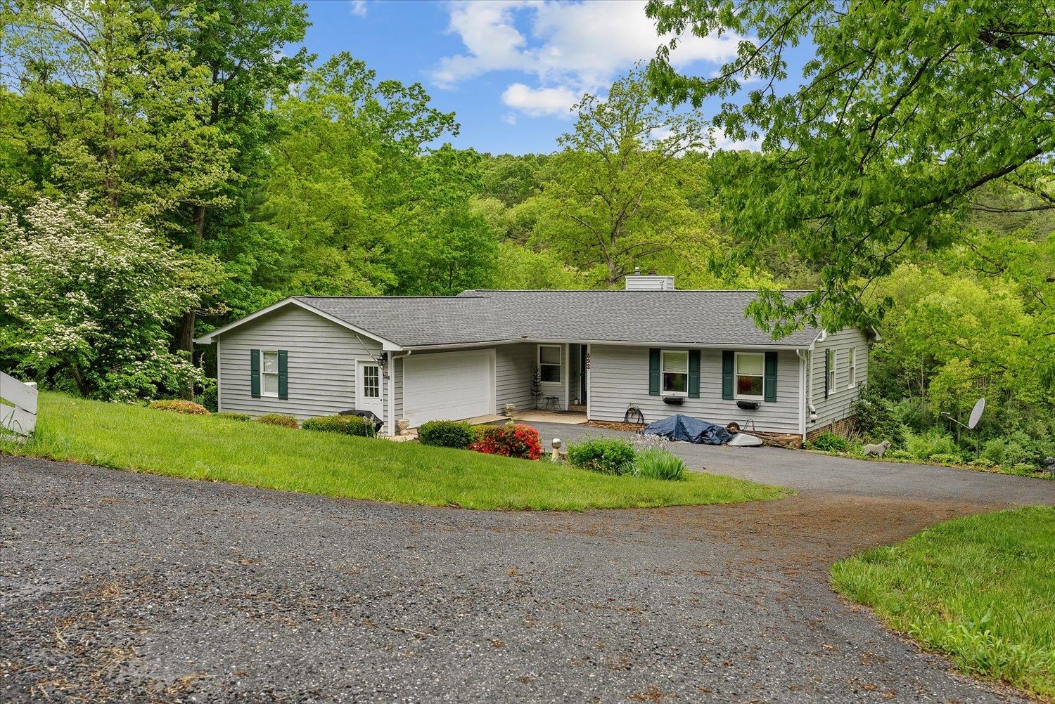592 Stover Shop Road Churchville, VA 24421 - Photo 1 of 36 a front view of house with yard and trees around