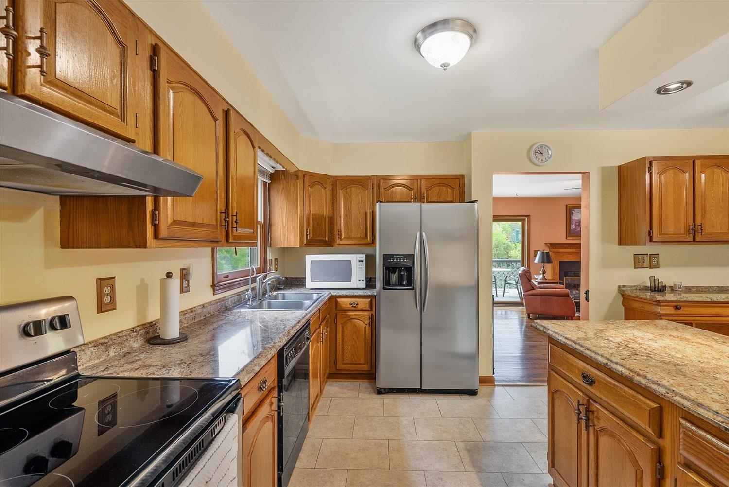 592 Stover Shop Road Churchville, VA 24421 - Photo 13 of 36 a kitchen with stainless steel appliances granite countertop a refrigerator a stove a sink and dishwasher