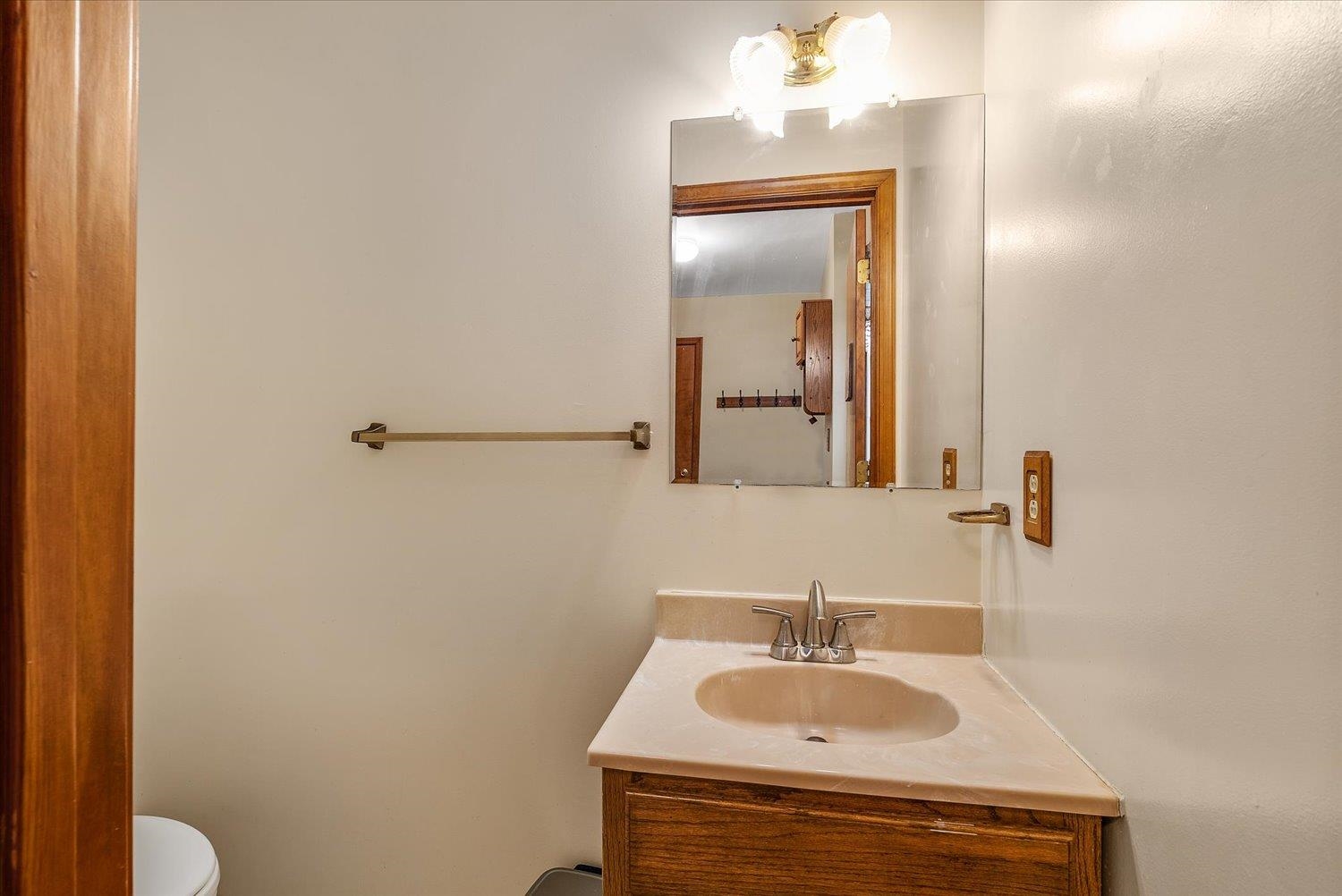 592 Stover Shop Road Churchville, VA 24421 - Photo 16 of 36 a bathroom with a sink and a mirror