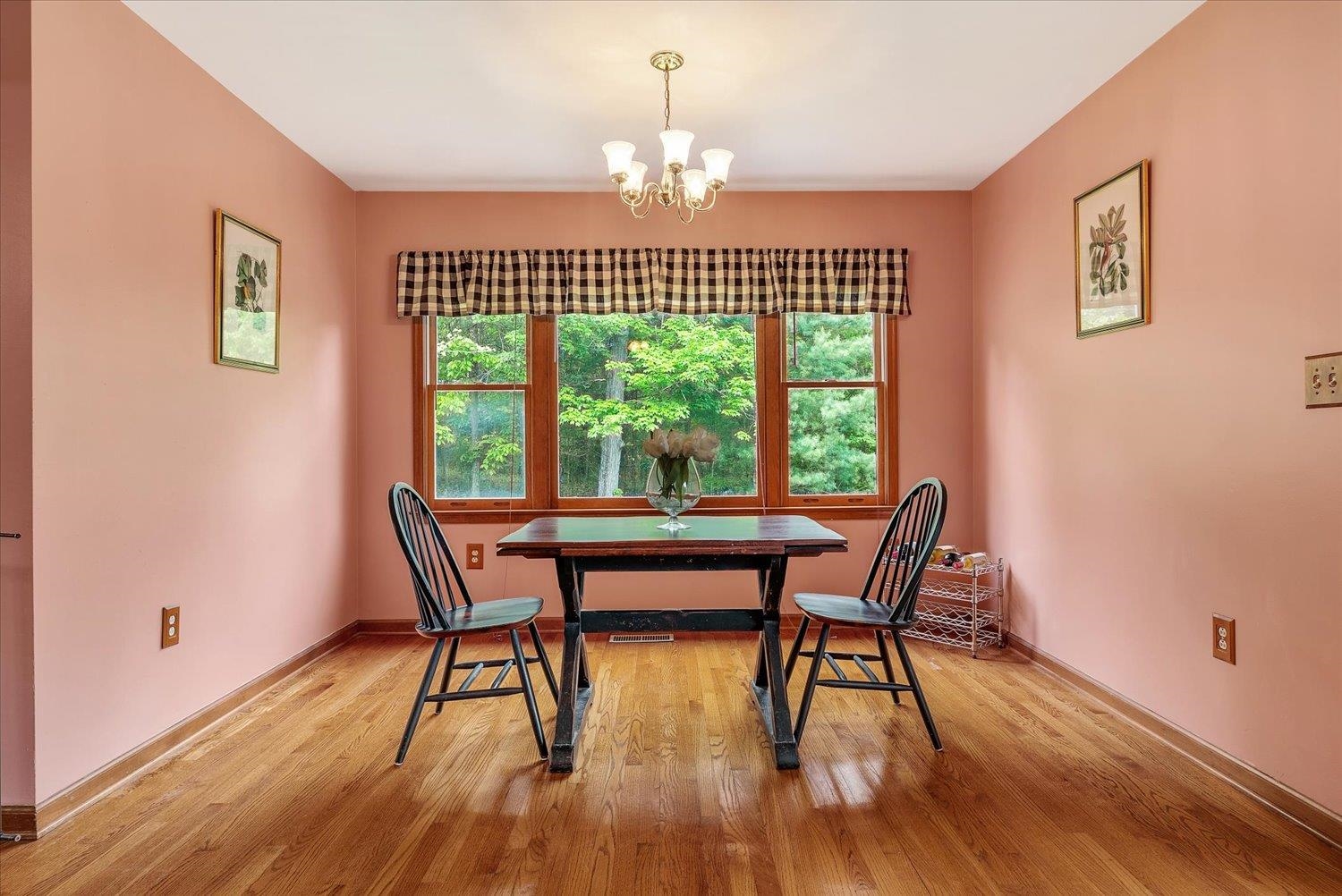 592 Stover Shop Road Churchville, VA 24421 - Photo 19 of 36 a dining room with furniture window and wooden floor
