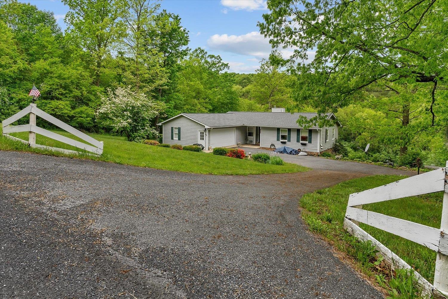 592 Stover Shop Road Churchville, VA 24421 - Photo 2 of 36 a house with trees in the background
