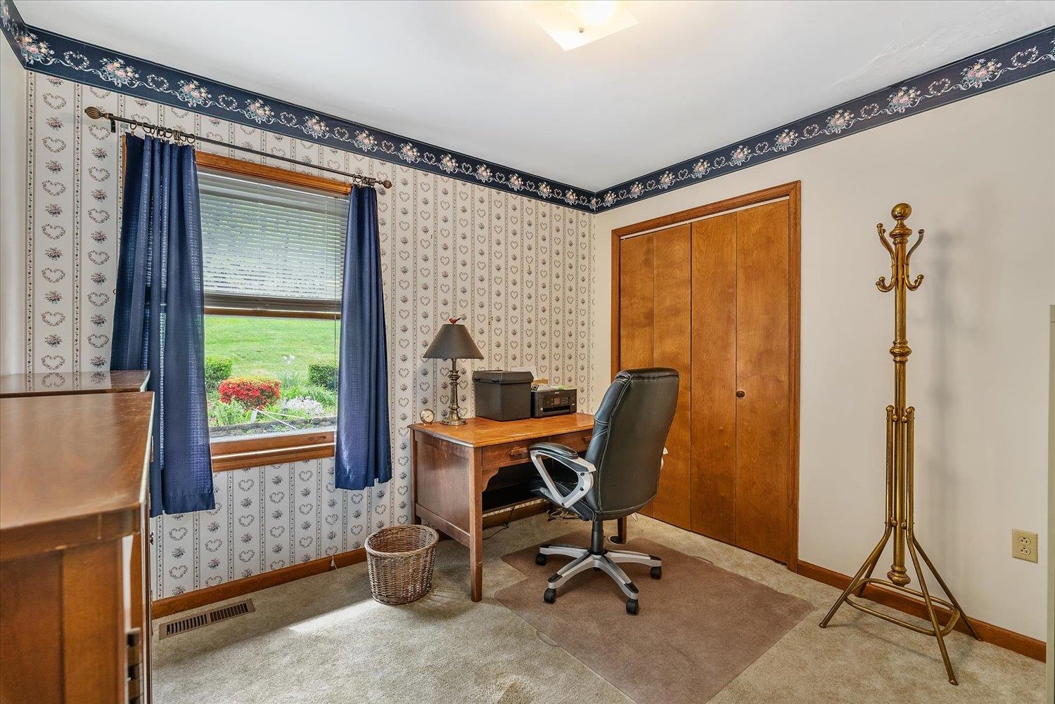 592 Stover Shop Road Churchville, VA 24421 - Photo 21 of 36 a view of a workspace with furniture and a window