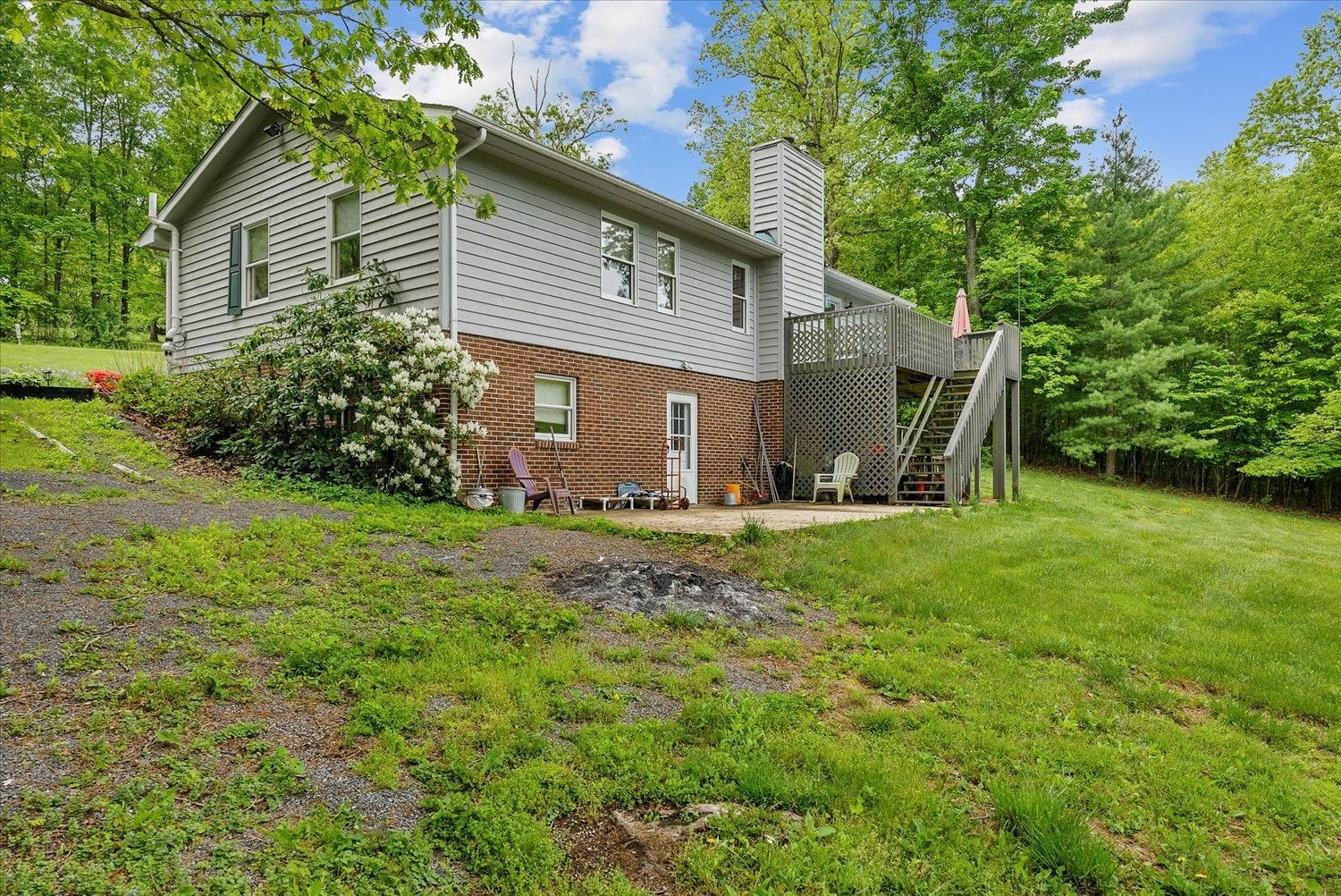 592 Stover Shop Road Churchville, VA 24421 - Photo 33 of 36 a view of a house with backyard and a tree
