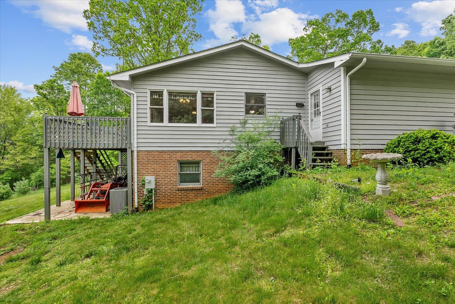 592 Stover Shop Road Churchville, VA 24421 - Photo 35 of 36 a view of a house with a yard and sitting area