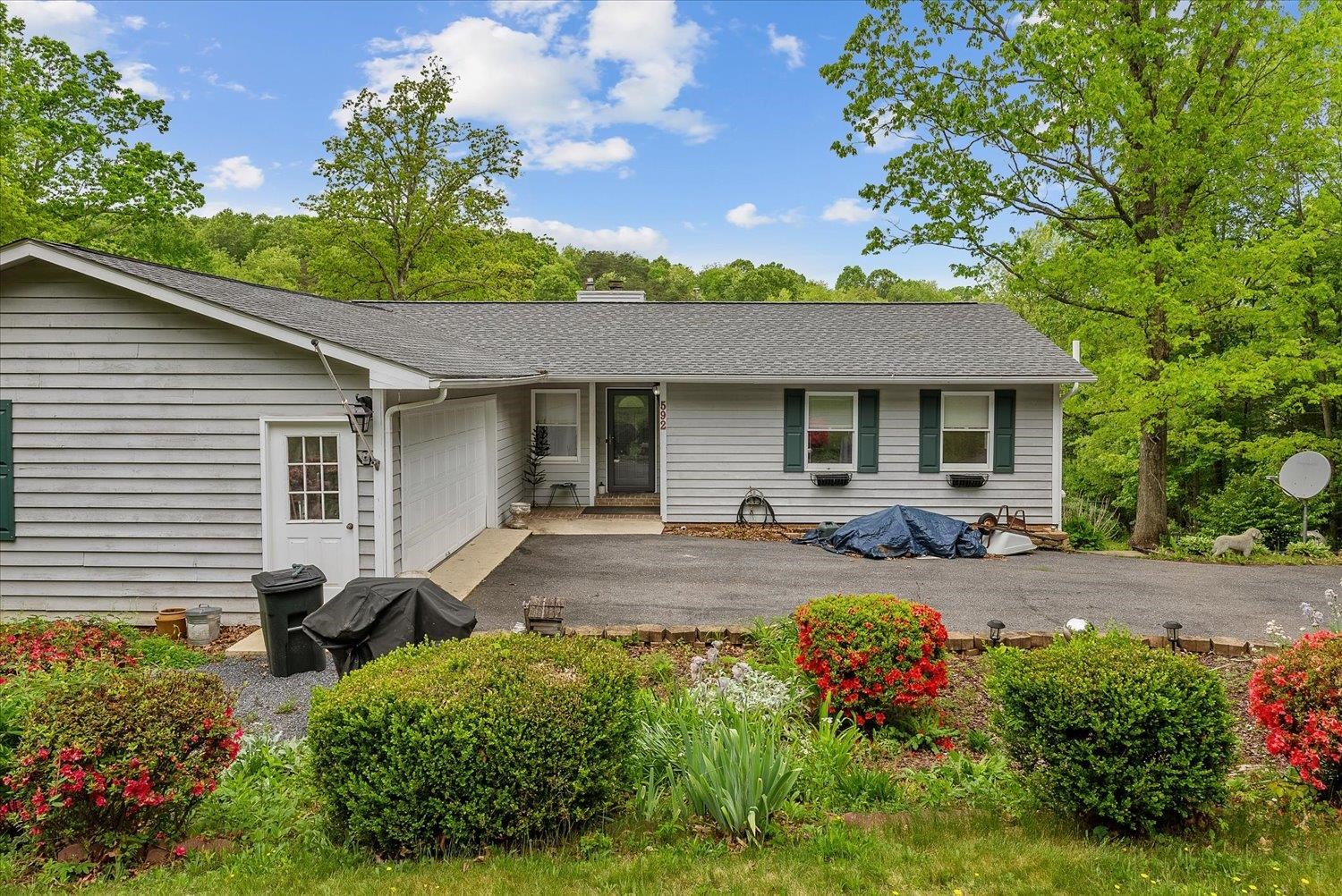 592 Stover Shop Road Churchville, VA 24421 - Photo 4 of 36 a view of a house with backyard and sitting area