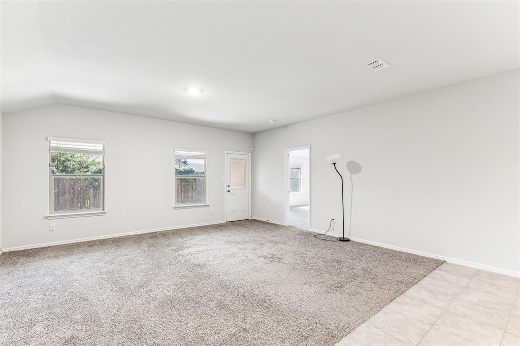 714 Wolf Creek Cleburne, TX 76033 - Photo 24 of 40 an empty room with windows