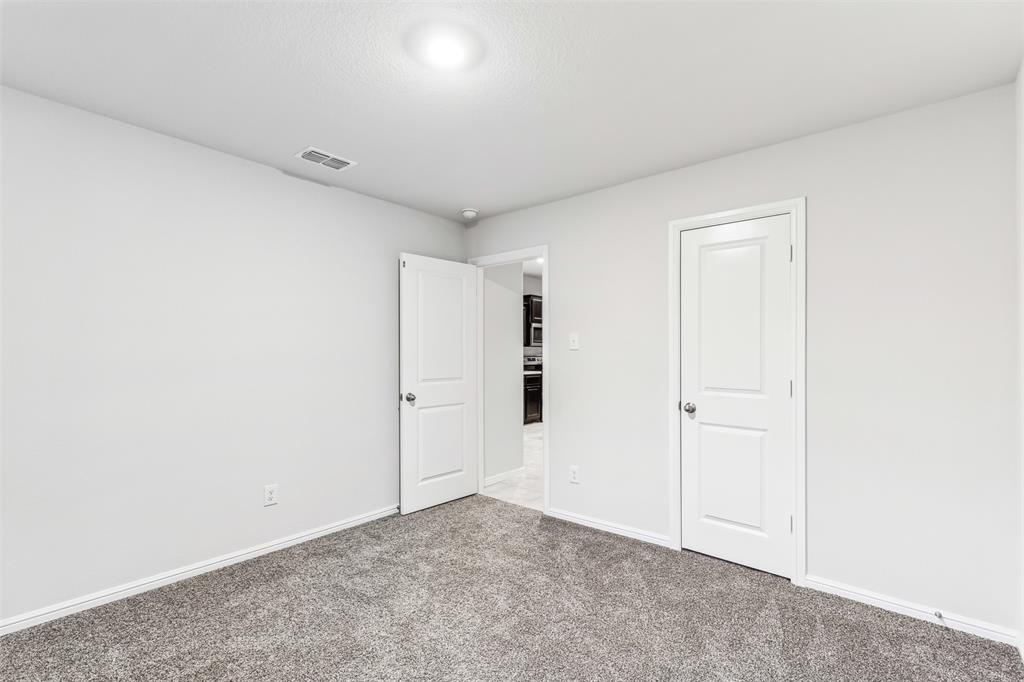 714 Wolf Creek Cleburne, TX 76033 - Photo 27 of 40 a view of an empty room