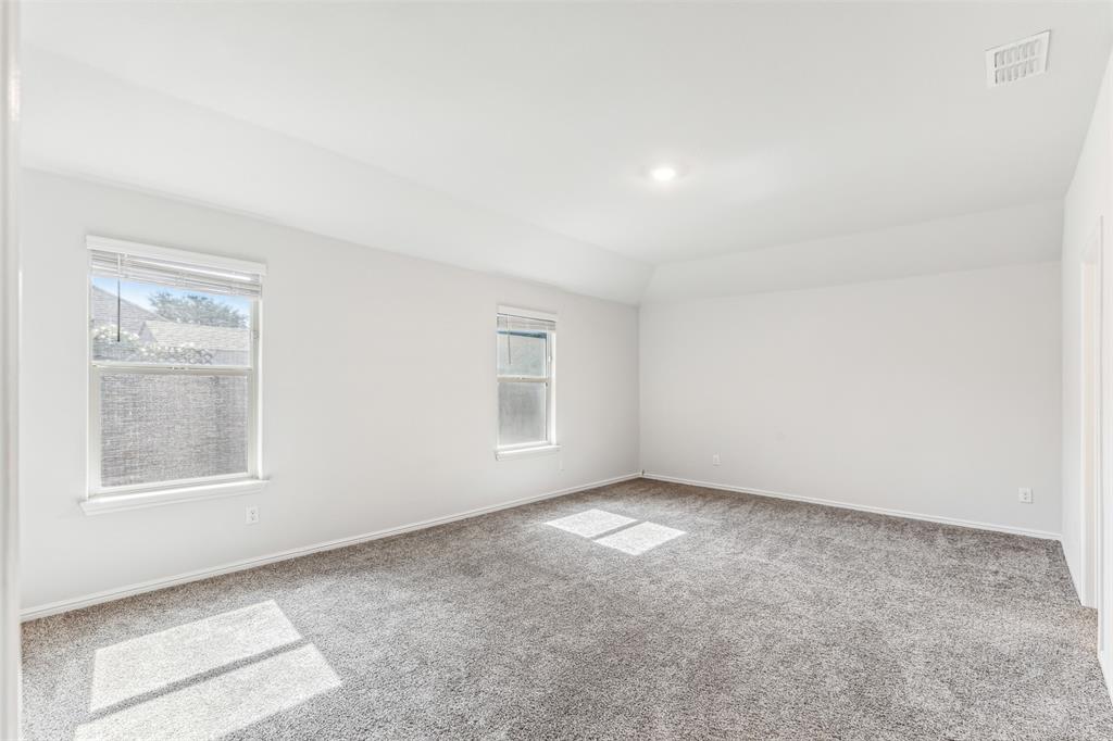 714 Wolf Creek Cleburne, TX 76033 - Photo 29 of 40 an empty room with a window