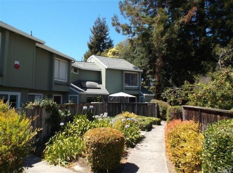 646 Racquet Club Circle Rohnert Park, CA 94928 - Photo 1 of 1 a front view of a house with a yard