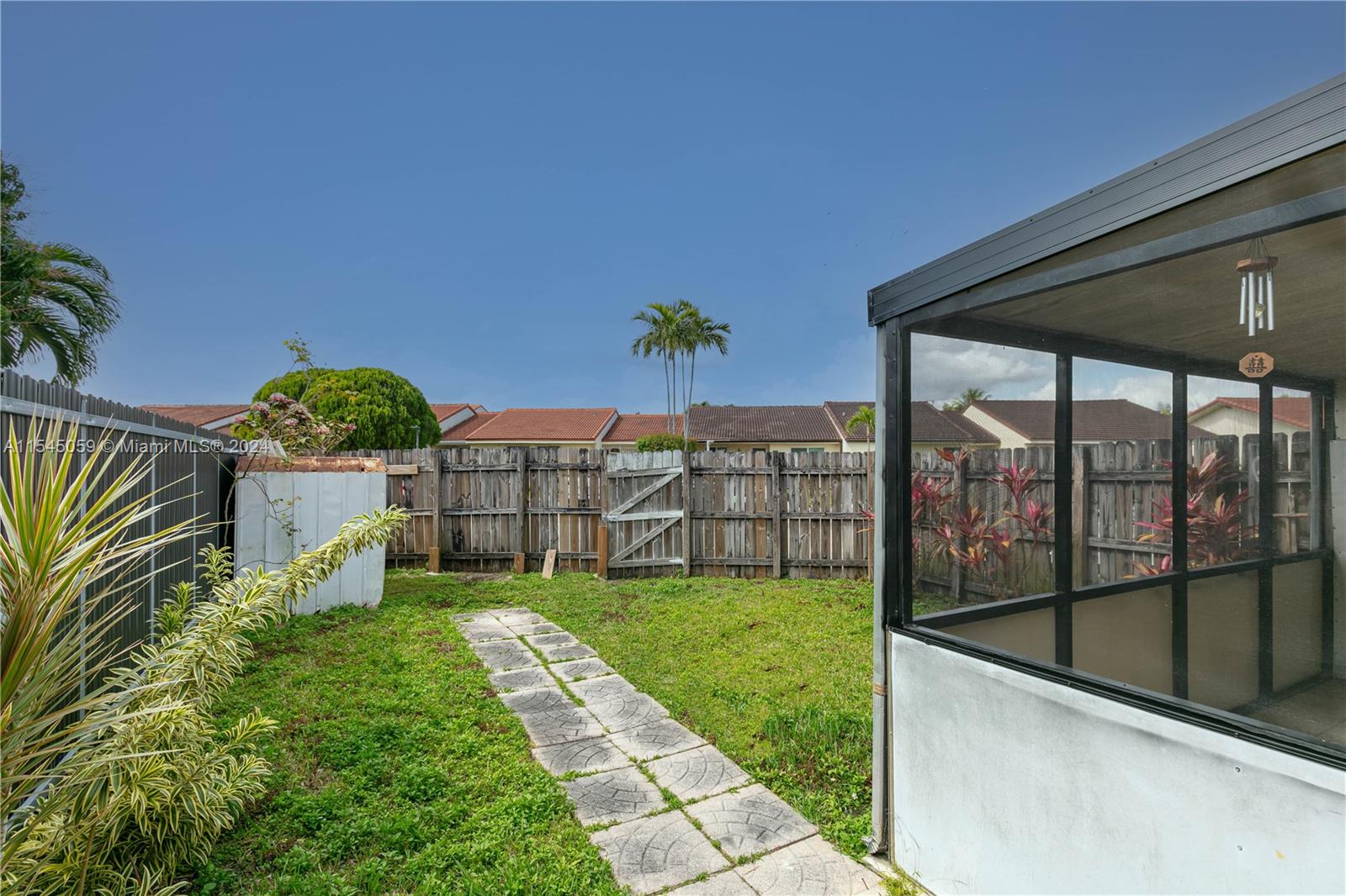 1490 Southwest 124th Pl Concourse Miami, FL 33184 - Photo 15 of 16 a view of a garden with a staircase