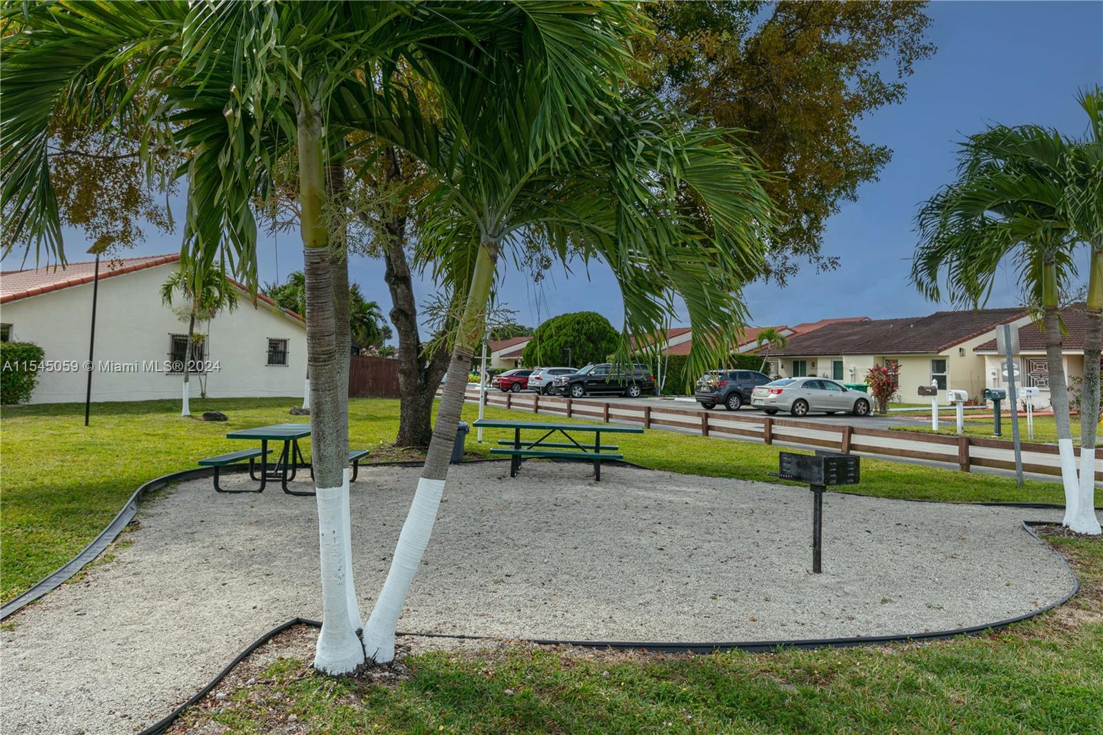1490 Southwest 124th Pl Concourse Miami, FL 33184 - Photo 4 of 16 a park with slide and palm trees