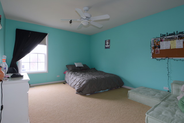 756 Ridge Drive Elburn, IL 60119 - Photo 13 of 18 a bedroom with a bed dresser and a window