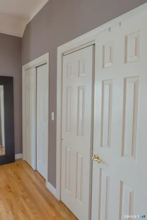 a view of a livingroom with wooden floor
