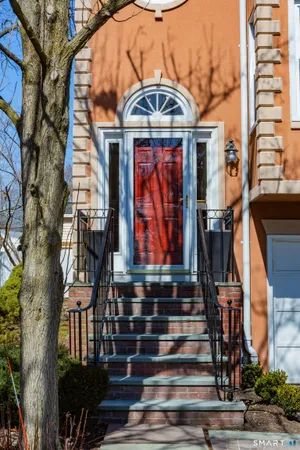 a front view of a building with street view